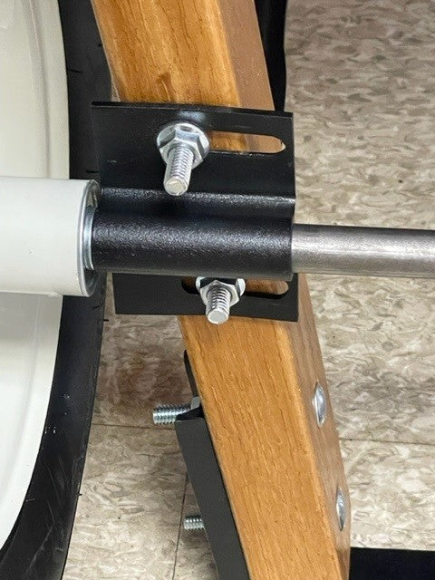 Close-up of cotter pin insertion on a Scenic Road two-wheel wheelbarrow axle