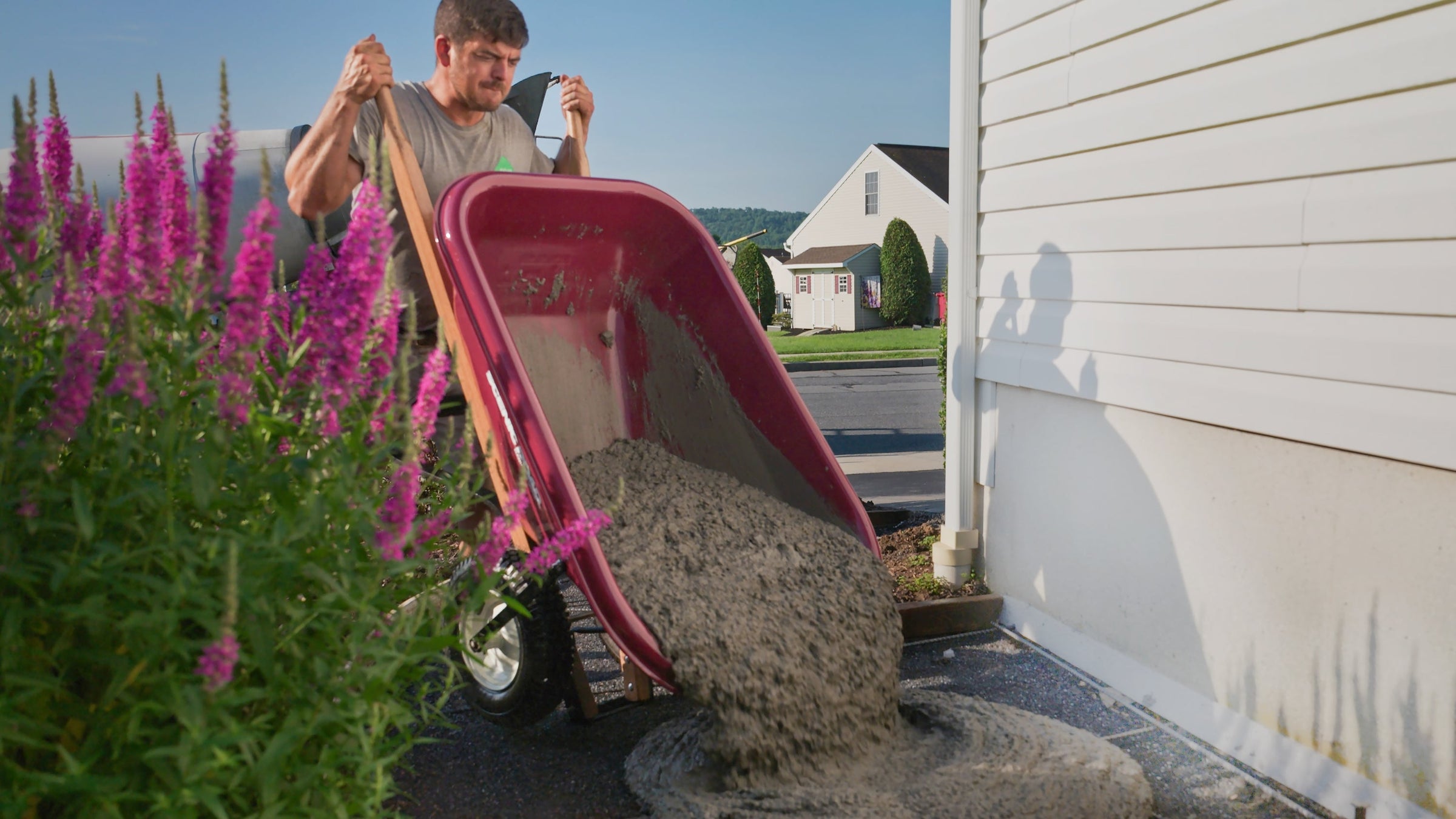 Scenic Road M-Series wheelbarrow pouring concrete